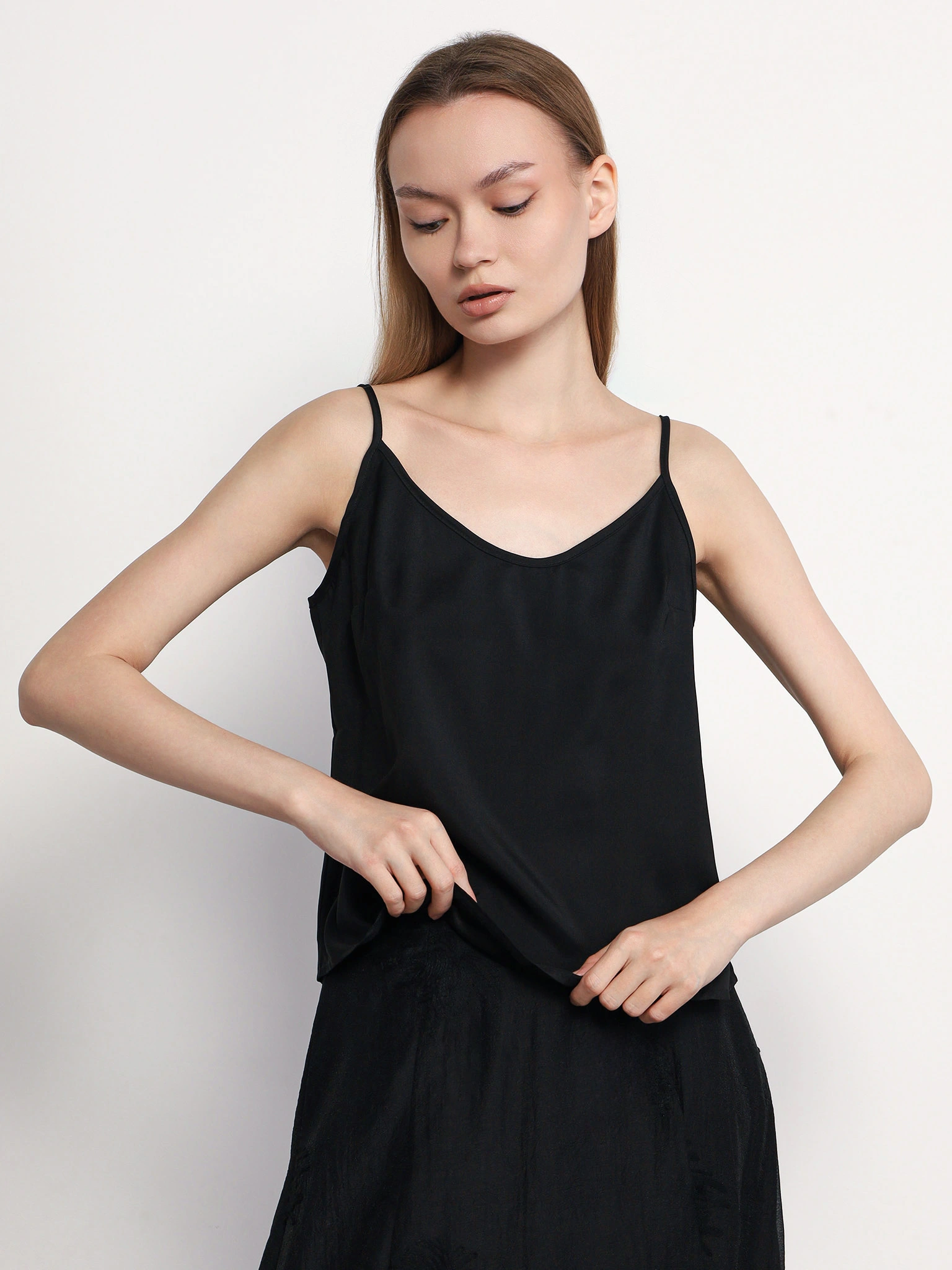 Топ черного цвета свободного кроя